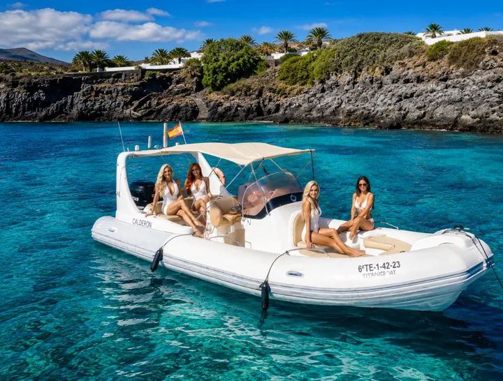 People on board a boat near the coast