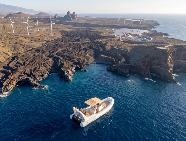 Aerial view of a boat and the coast